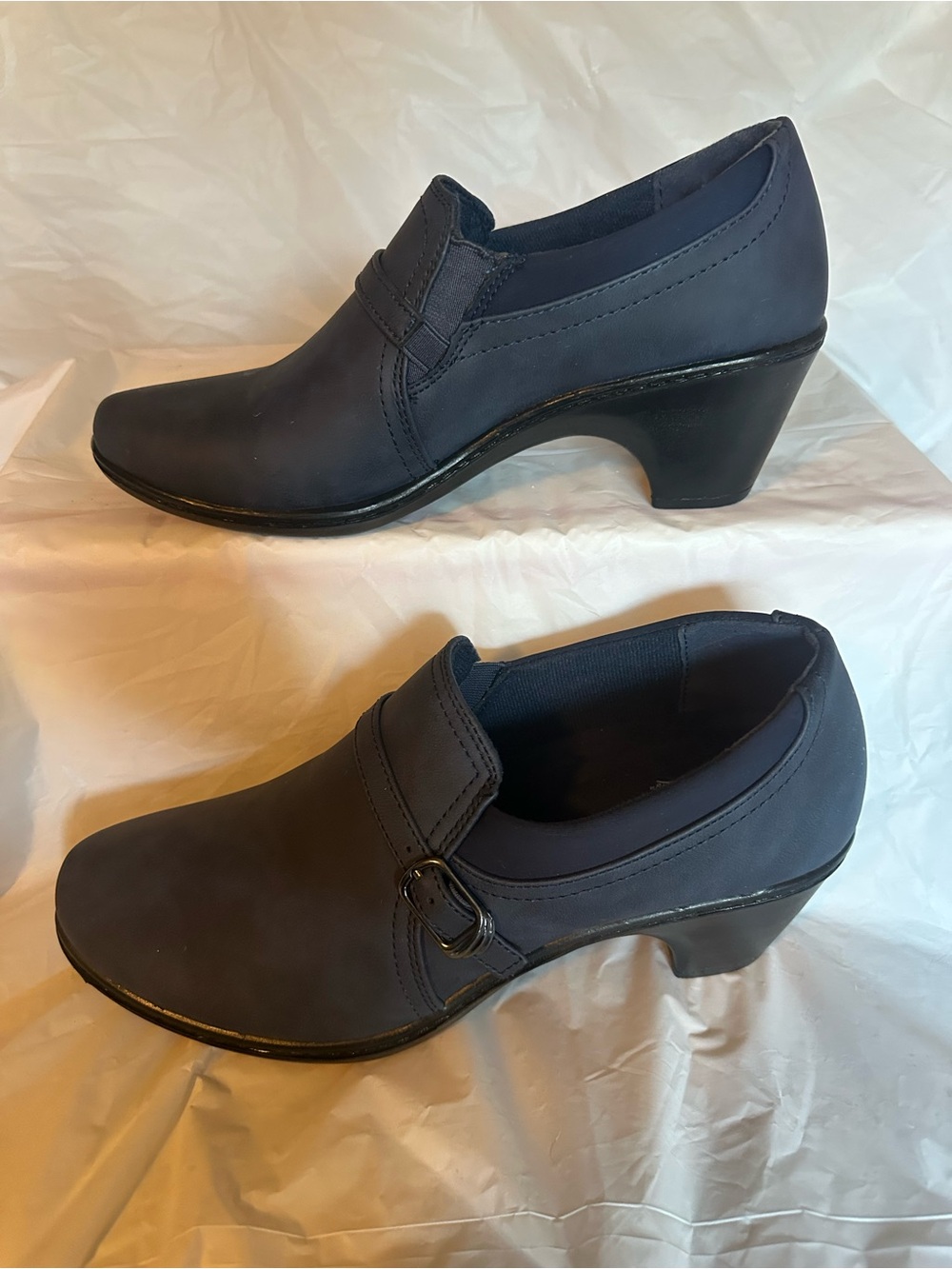 Women's Navy Heeled Slip-On Loafers. Easy street comfort waves.